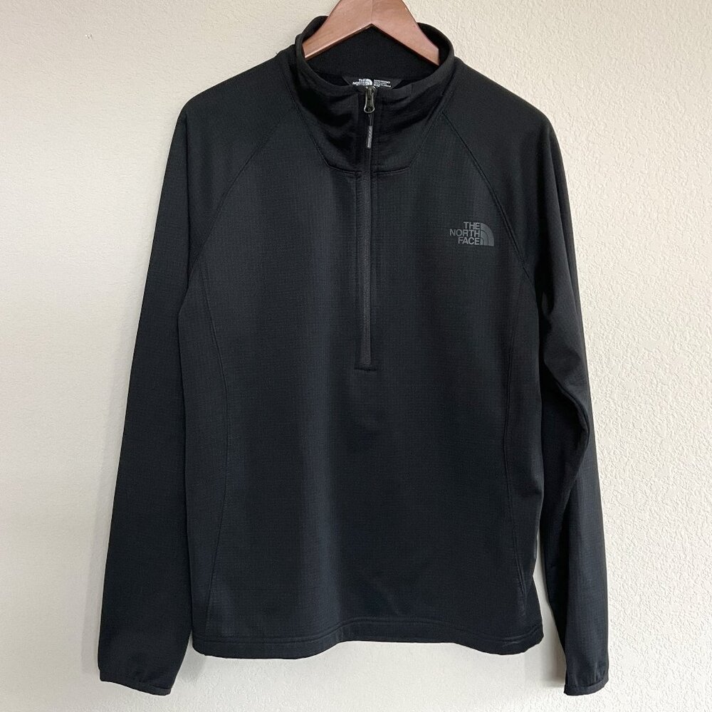 The North Face Lightweight 1/4 Zip - Fleece textured.